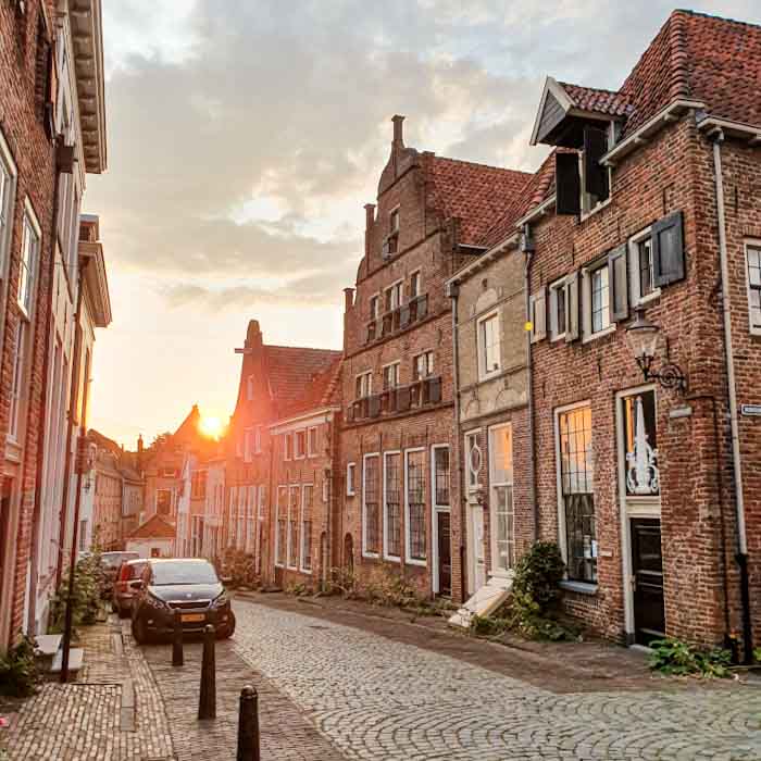 Deventer street with houses in sunset- Discover True Netherlands