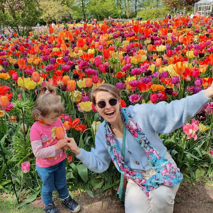 Keukenhof tulip garden - Me and a child in front of pink tulips - Discover True Netherlands