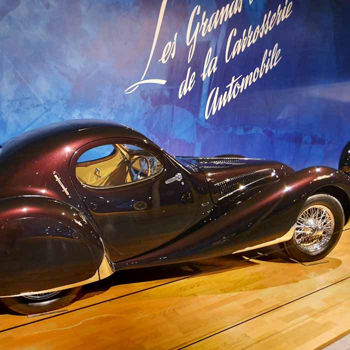 Louwman Museum in Den Haag - old violet car - Discover True Netherlands