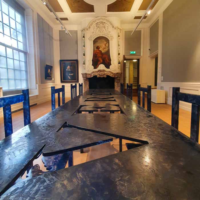 Museum de Fundatie next to castle Nijenhuis - black glass table - Discover True Netherlands