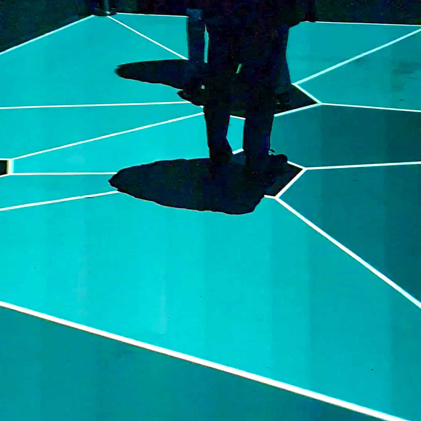 NXT Museum in Amsterdam - blue projections on the floor - Discover True Netherlands