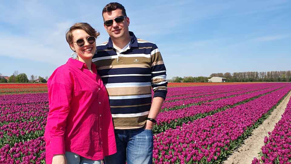 Together with my husband in the pink tulip fields - Discover True Netherlands 4x3